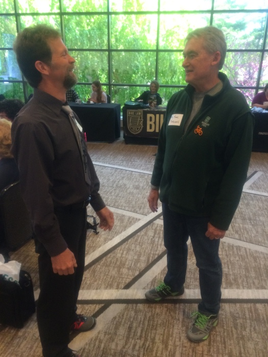 Steve Clark from the League of American Bicyclists chatting with Mayor Mark Meadows, E. Lansing